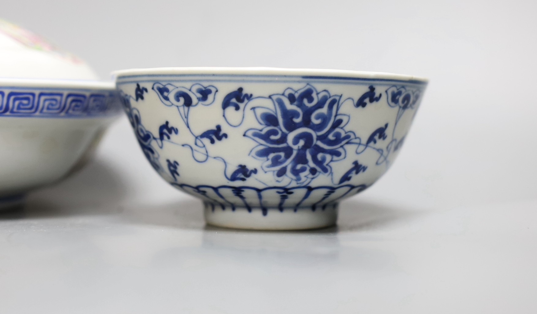 3 pieces of early 20th century Chinese porcelain to include a bowl and cover, saucer dish and a blue and white bowl, largest 19.5cm diameter